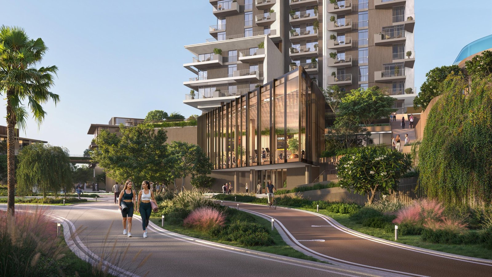 Rise by Athlon Dubai Land Dubai tower skyline view surrounded by lush greenery and community wellness amenities