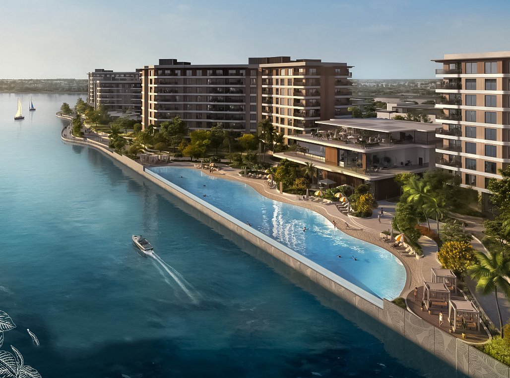 Stunning sunset over the waterfront promenade at Gardenia Bay by Aldar, offering serene views on Yas Island.